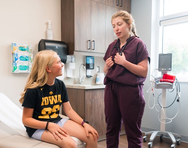 Provider%20with%20patient%20Dylan.jpg